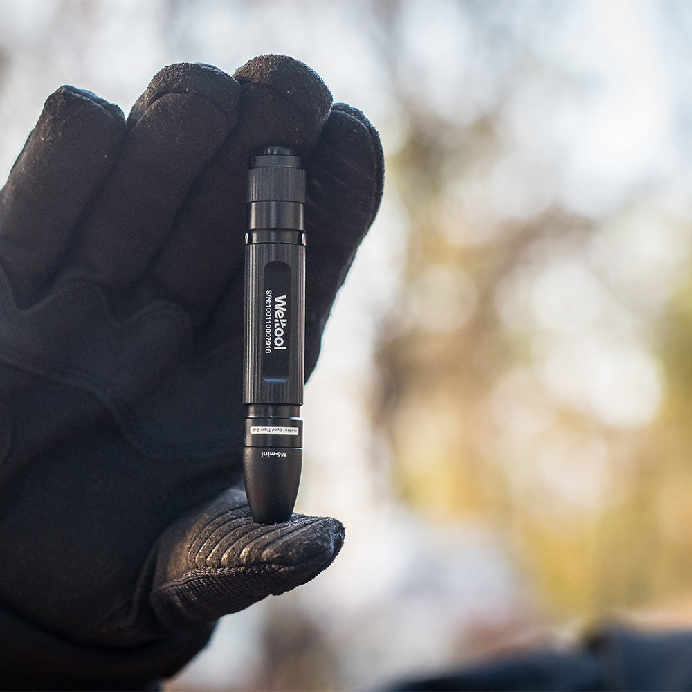 Weltool M6-Mini penlight size in hand