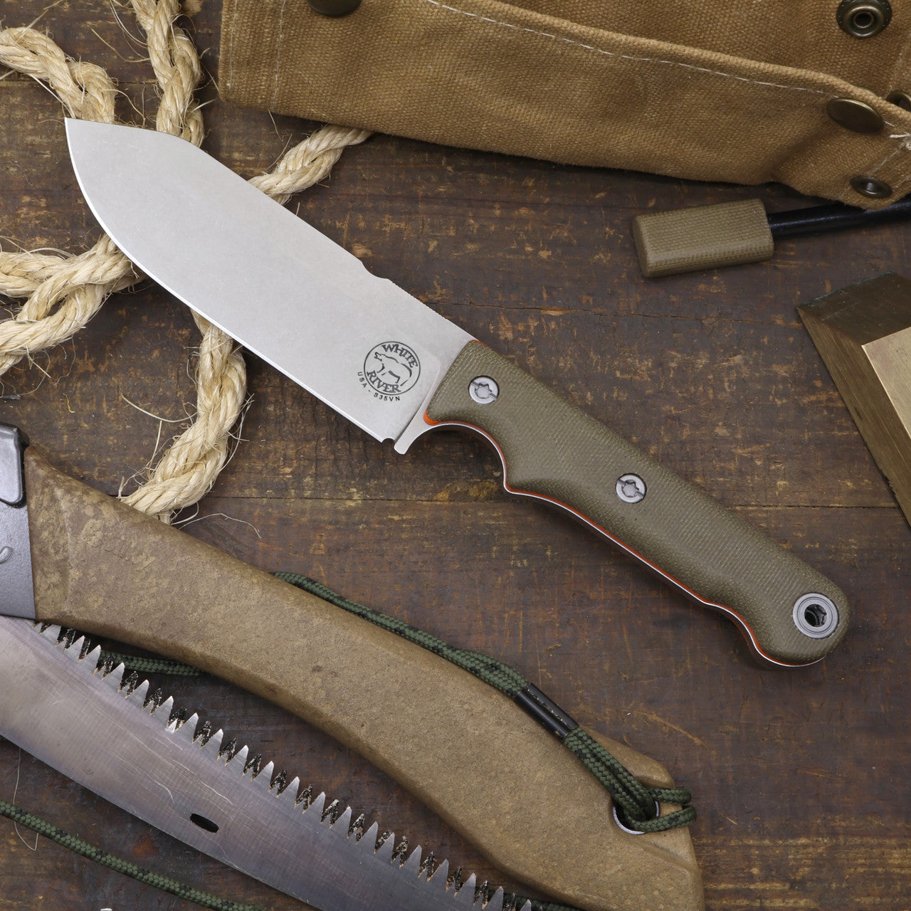 White River Firecraft FC5 (WRFC5) green canvas Micarta handle detail